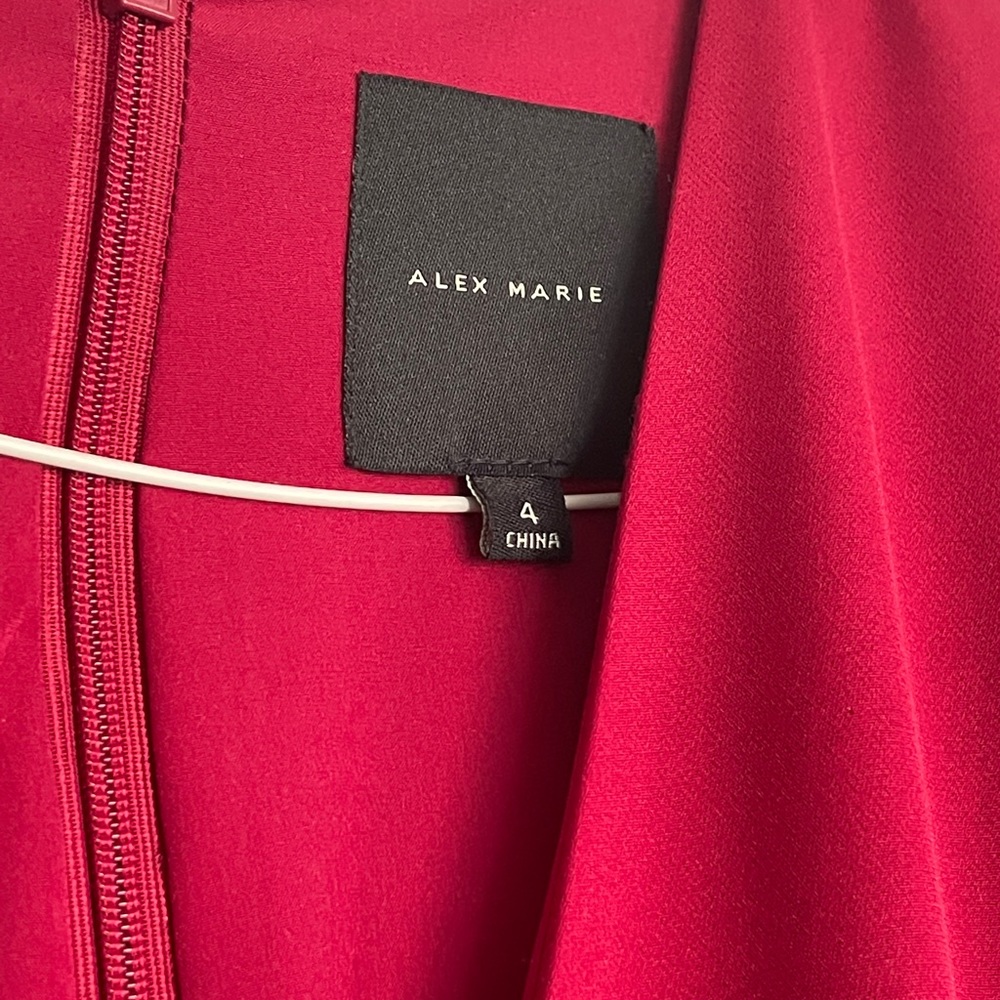 Long red jumpsuit. No wear or tear.  Worn once.